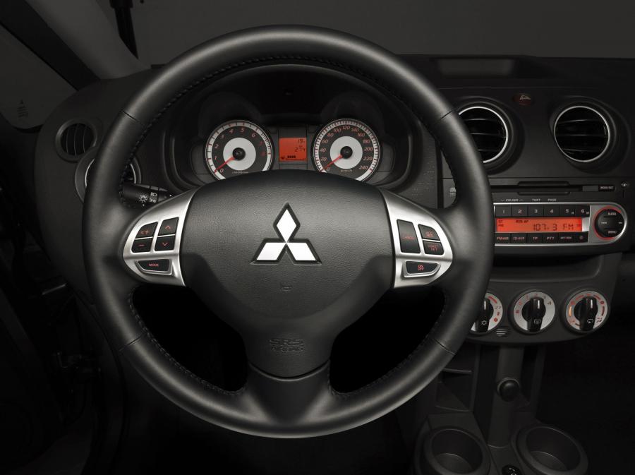  Mitsubishi Colt 2009 года  (фото 2 из 36)